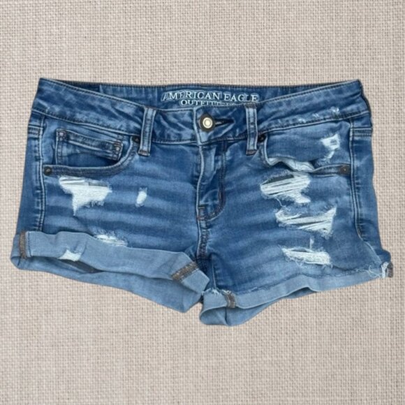 American Eagle Super Low Rise Shortie Denim Booty Cut Off Shredded Shorts Size 6 - Picture 1 of 10